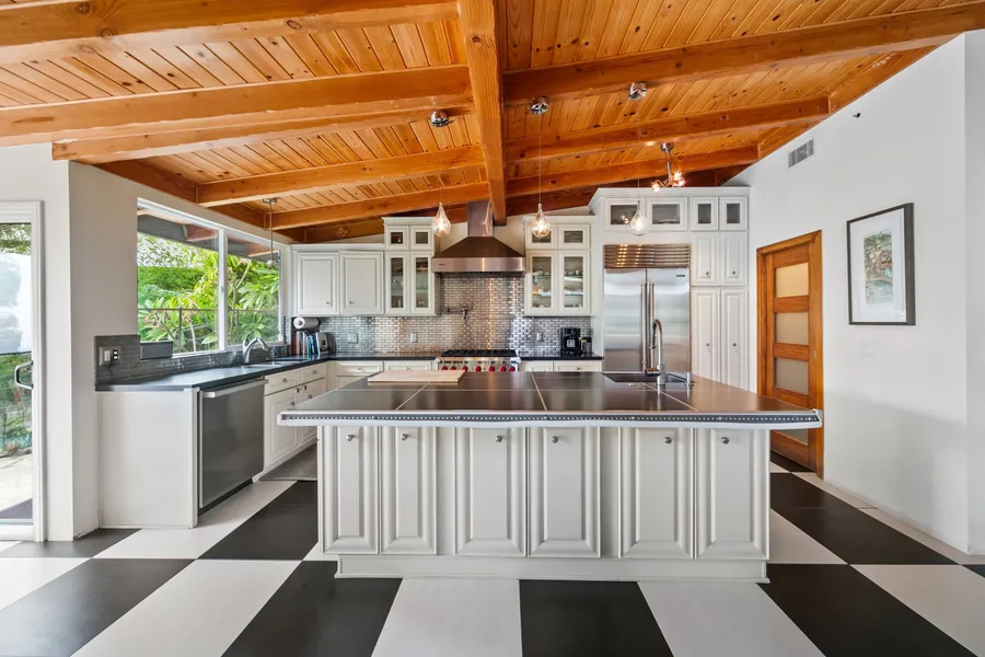 1470 N Tigertail Rd  $4,495,000 $4,750,000 5%